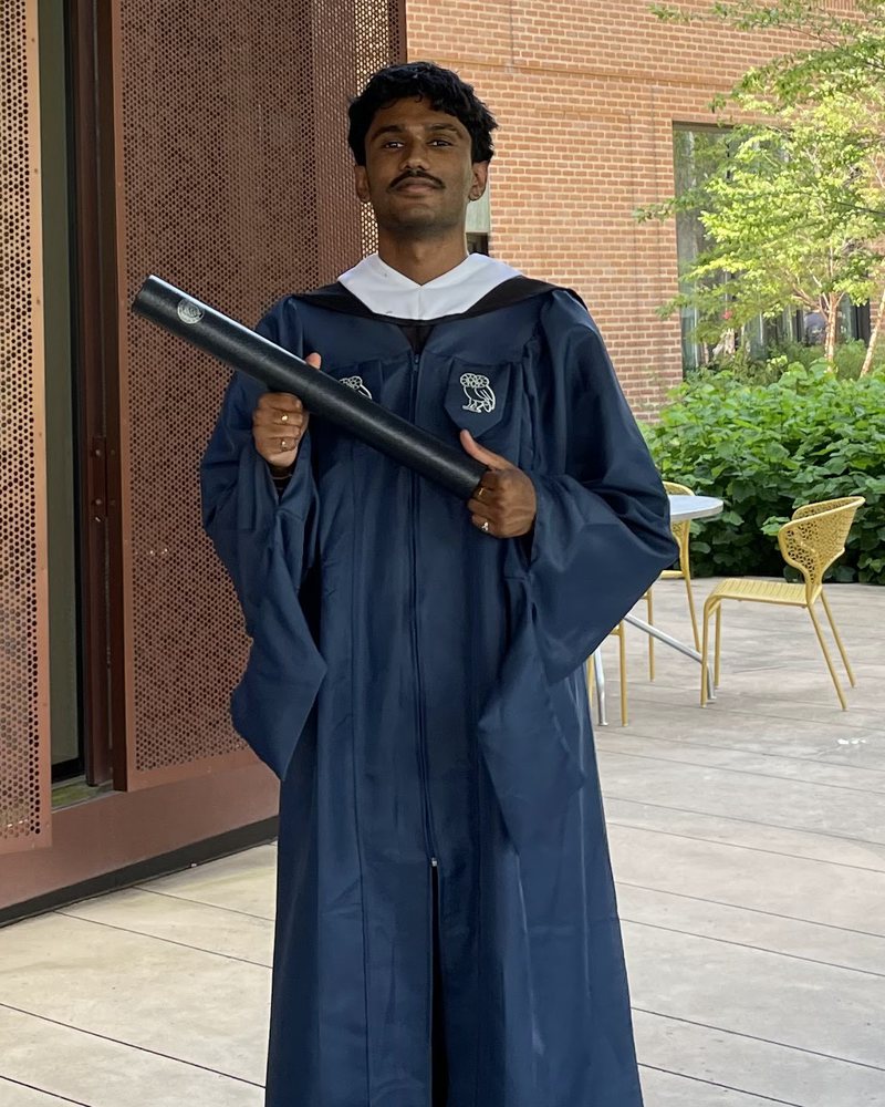 Pawan Thiruverkadu at graduation, holding a diploma